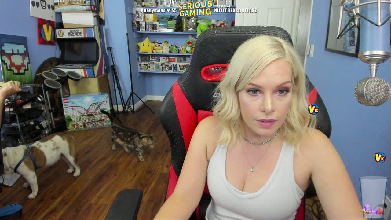 Victoria from 'Serious Gaming' rolls over her dog's paw with a chair ...