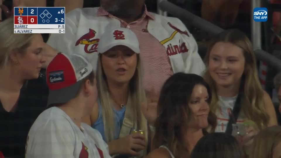 Young Red Sox fan gives ball to girl behind him