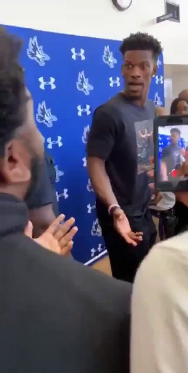 Jimmy Butler and his peculiar way of playing dominoes on his visit