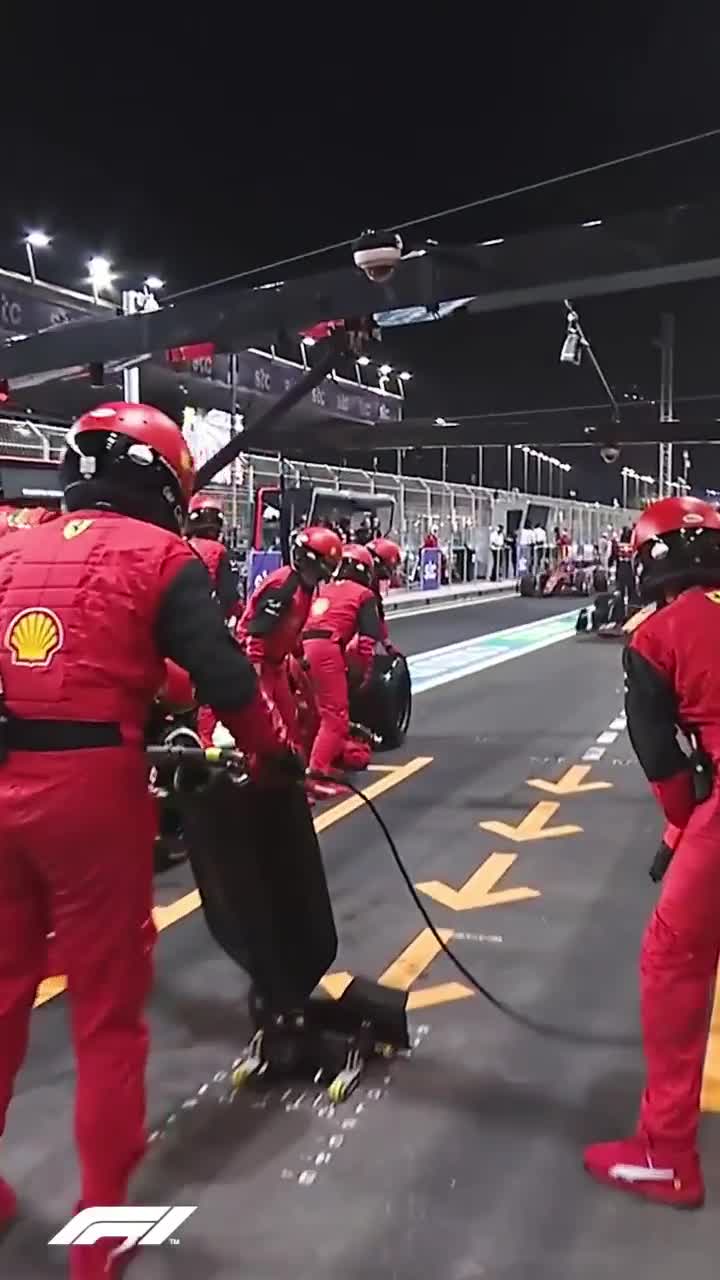 Ferrari doing a perfect double-stack pit stop