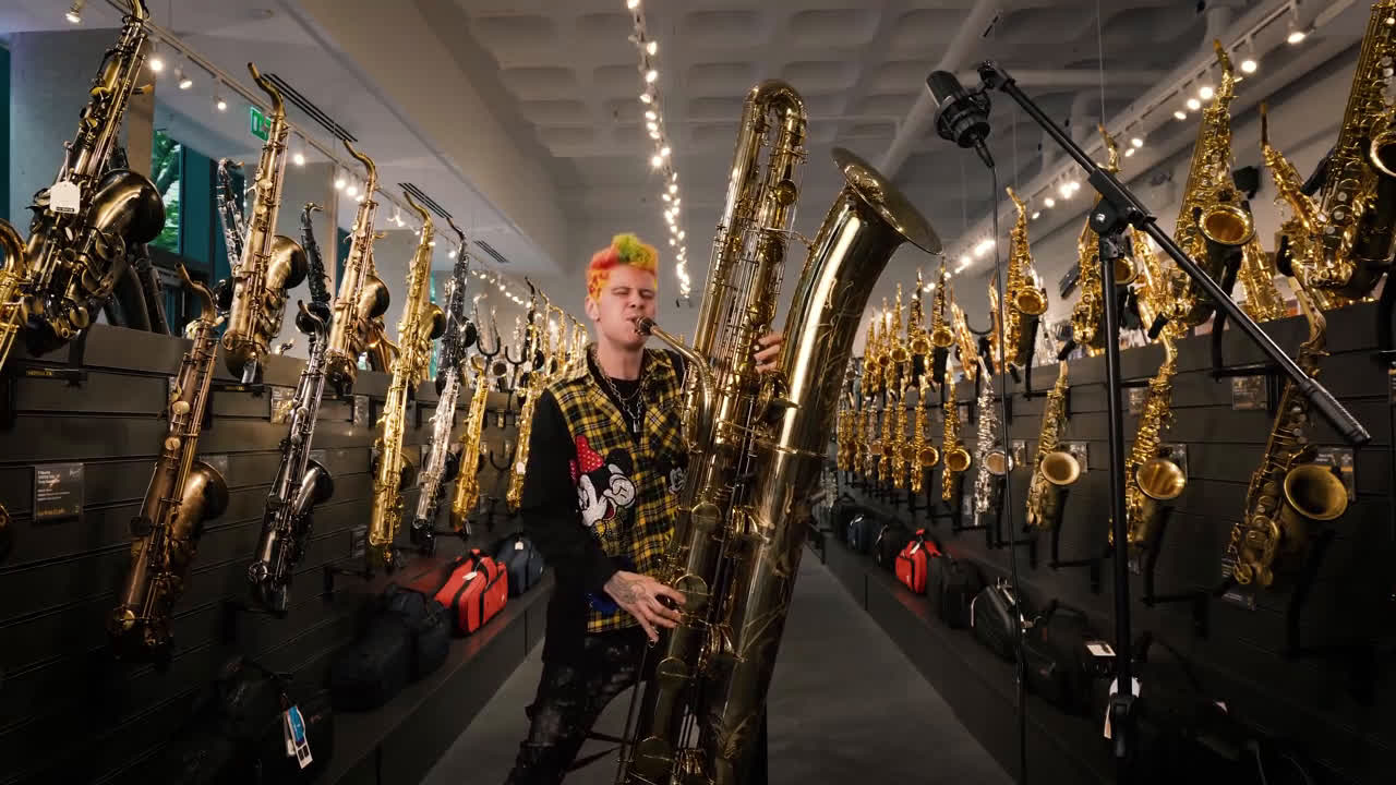 Leo P (from Too Many Zooz) plays the contrabass saxophone