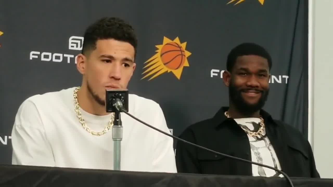 LeBron James congratulated Devin Booker post-game with a signed