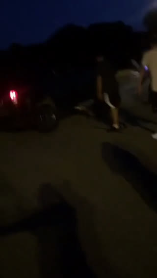 Watch Kid survives being run over by a car in high school parking lot ...
