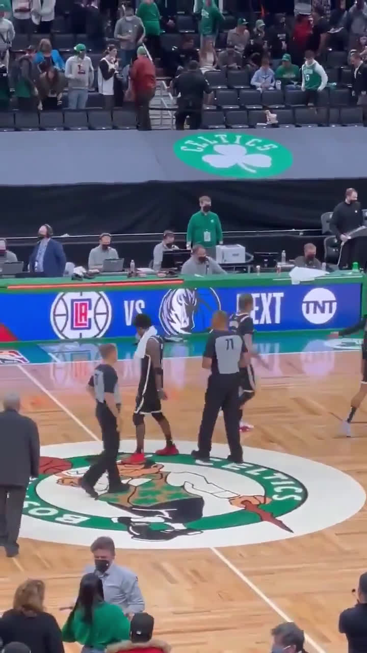 kyrie irving steps on celtics logo
