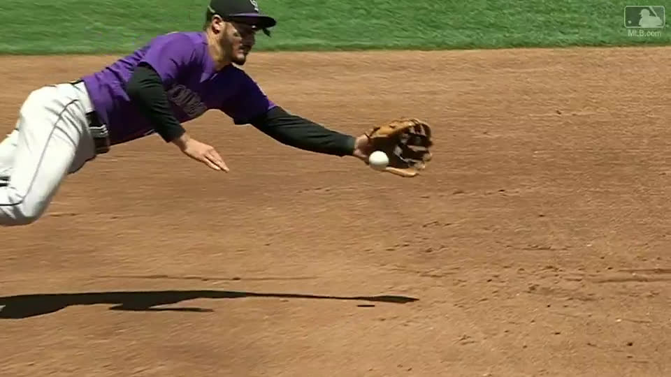 Arenado dives, throws out Blach from his back 