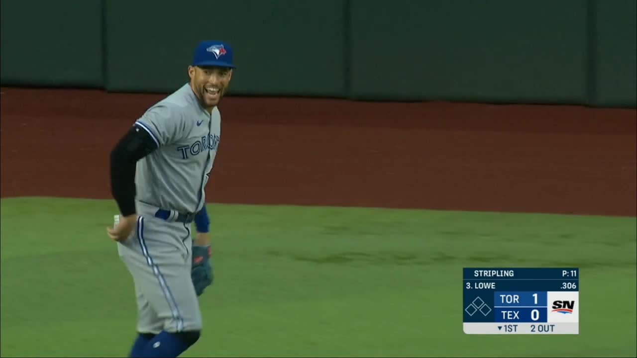 Center fielder George Springer makes a no-look catch in left field