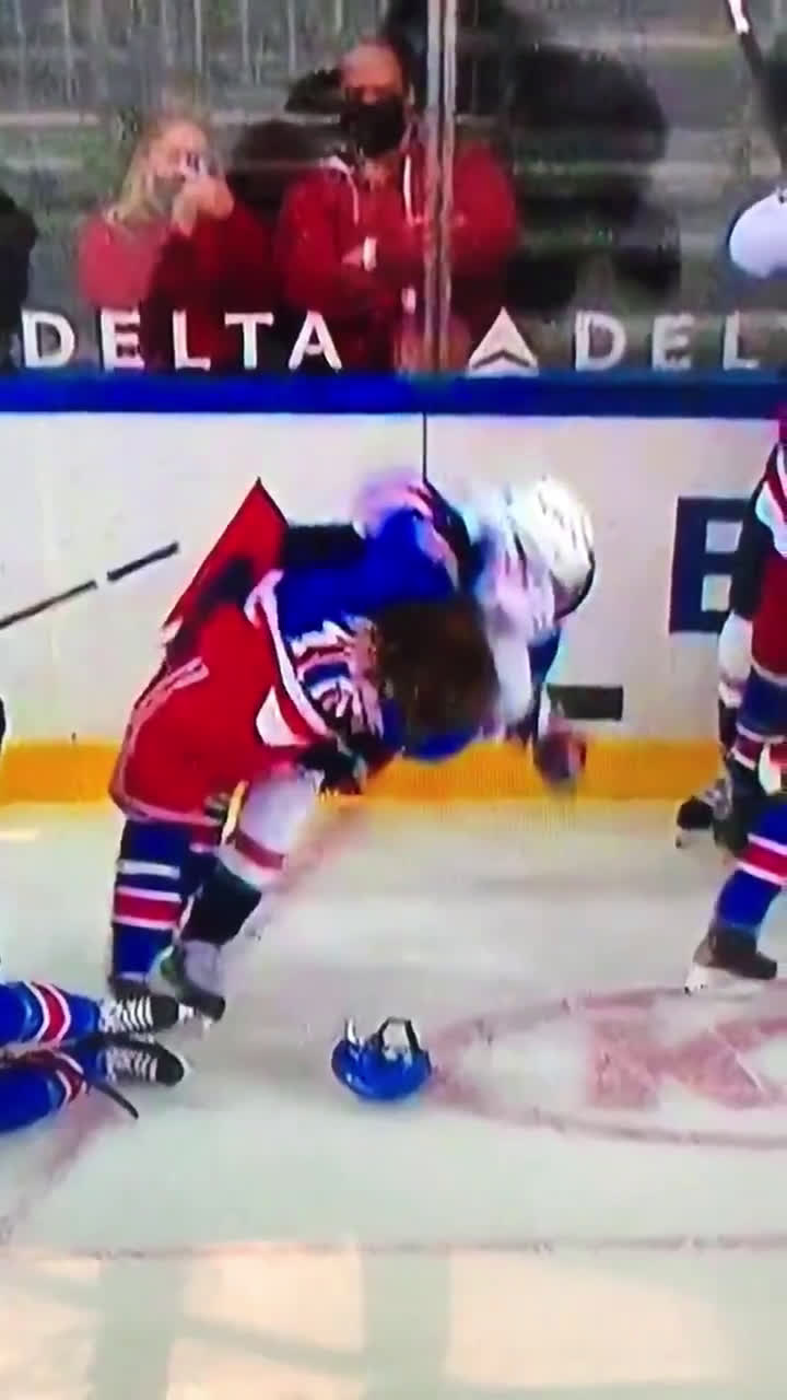 Alternate angle showing Wilson pull Panarins hair before slamming him down  to the ice : r/hockey