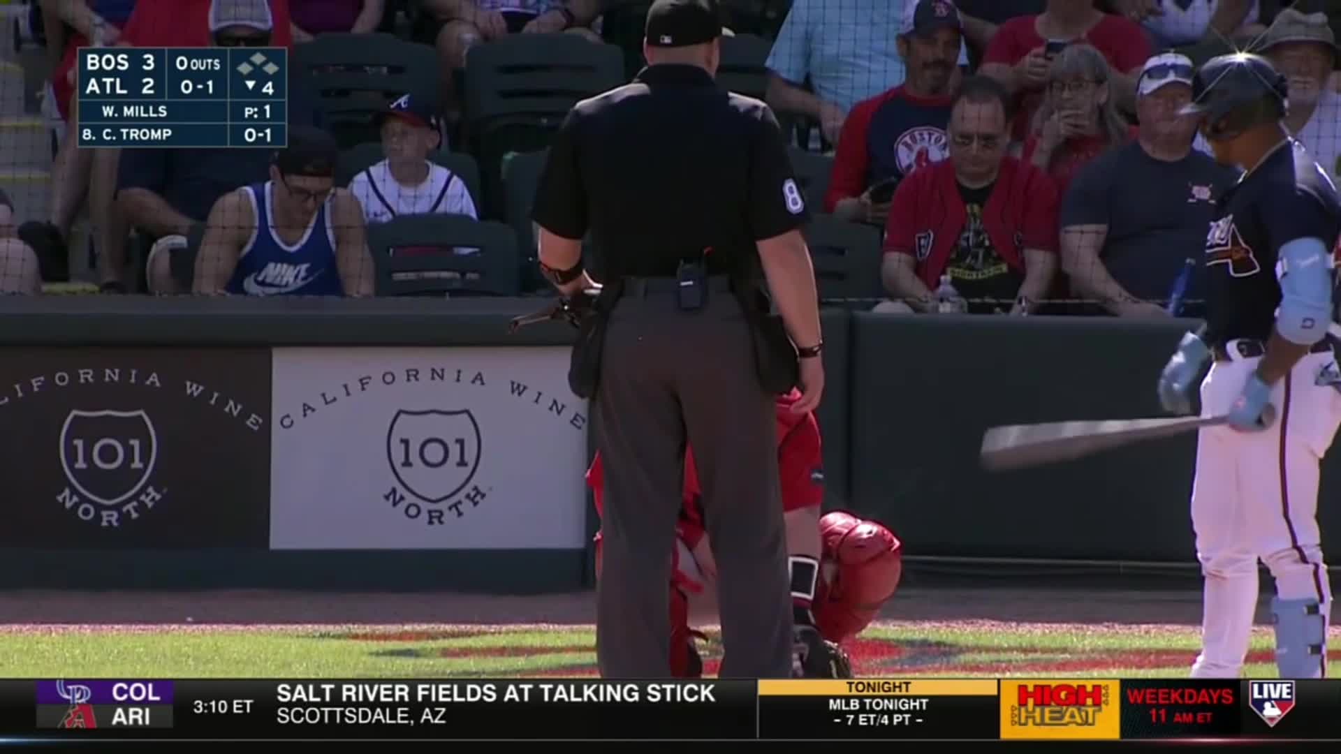 The umpire uses his "the catcher just got hit in the nuts, stop the