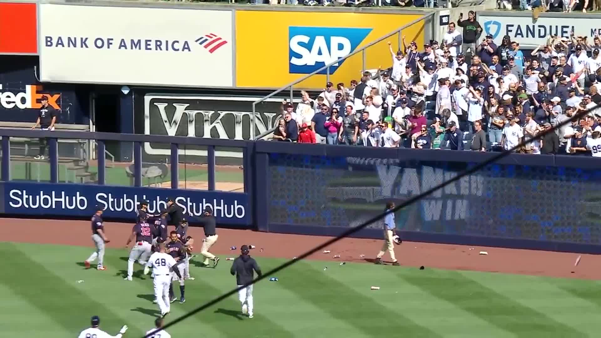 Yankees fans start throwing stuff on the field after the Yankees walkoff the Guardians.