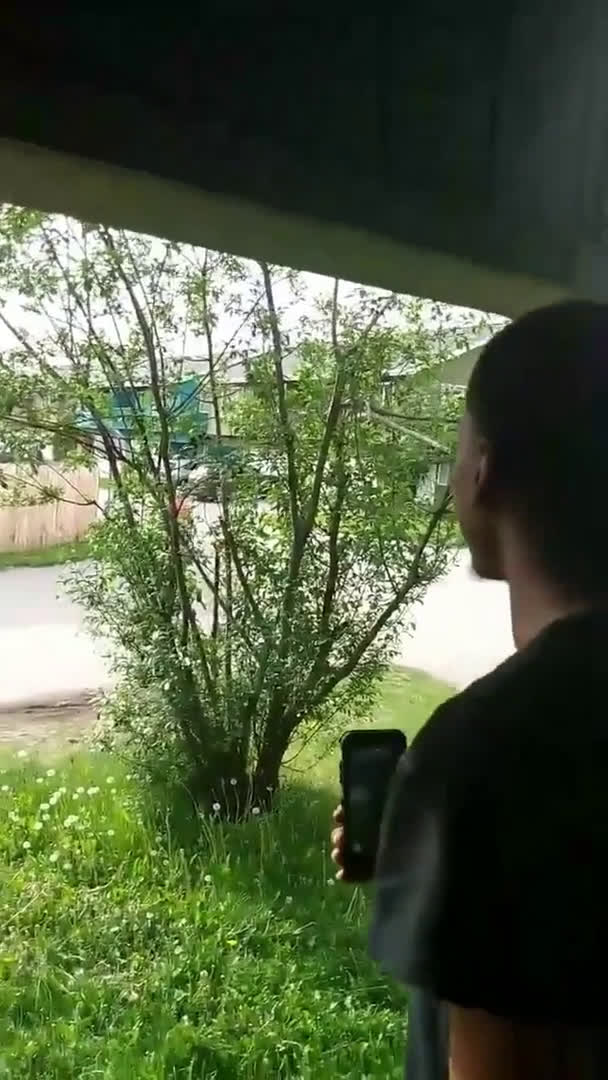 Woman calls police on man sitting in his car outside his own house