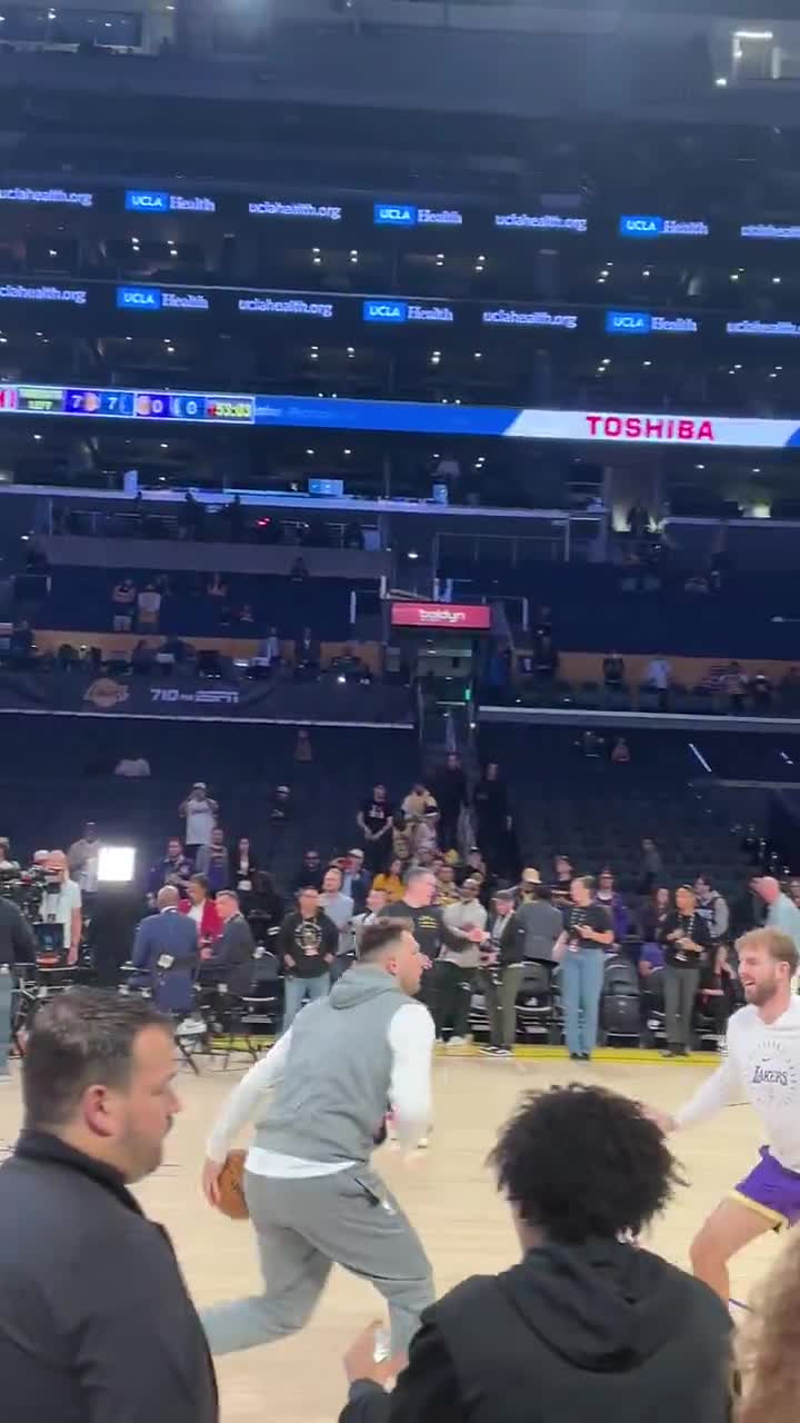 Watch Luka Doncic warms up with Nico Harrison near him | Streamable