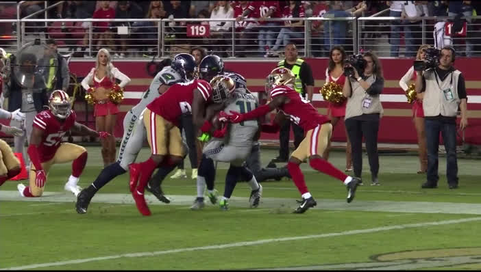 49ers' Jaquiski Tartt rips ball from Seattle's DK Metcalf on