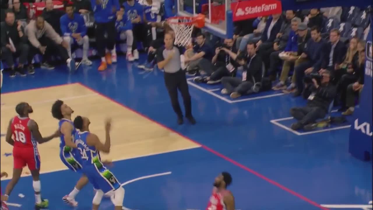 Highlight Joel Embiid commits a flagrant 1 on Giannis in transition r/nba