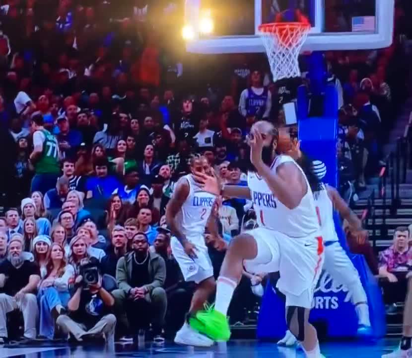Kawhi makes the lay up and Harden feels the power.
