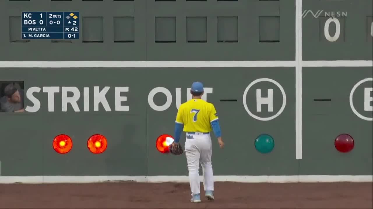 Masataka Yoshida of the Boston Red Sox runs out a ground ball