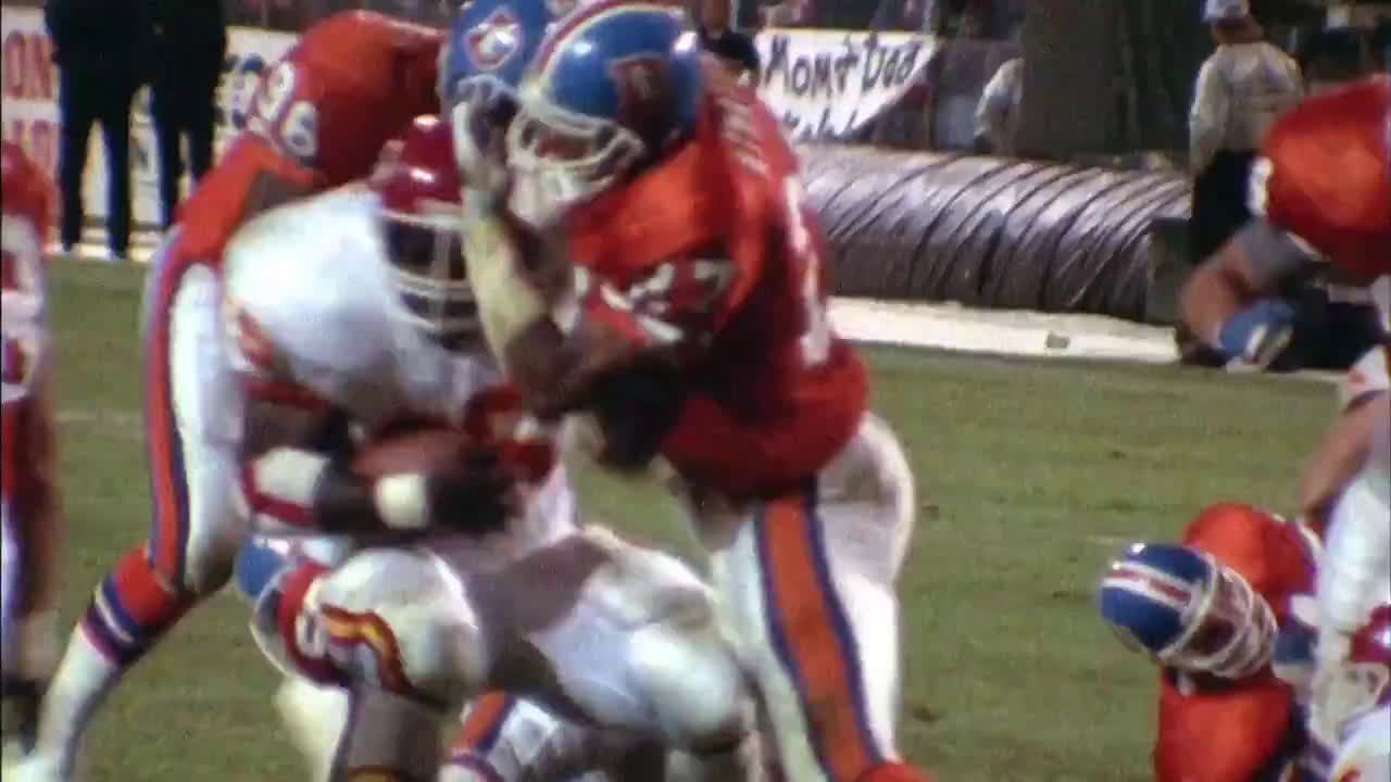 Steve Atwater stops Christian Okoye in his tracks