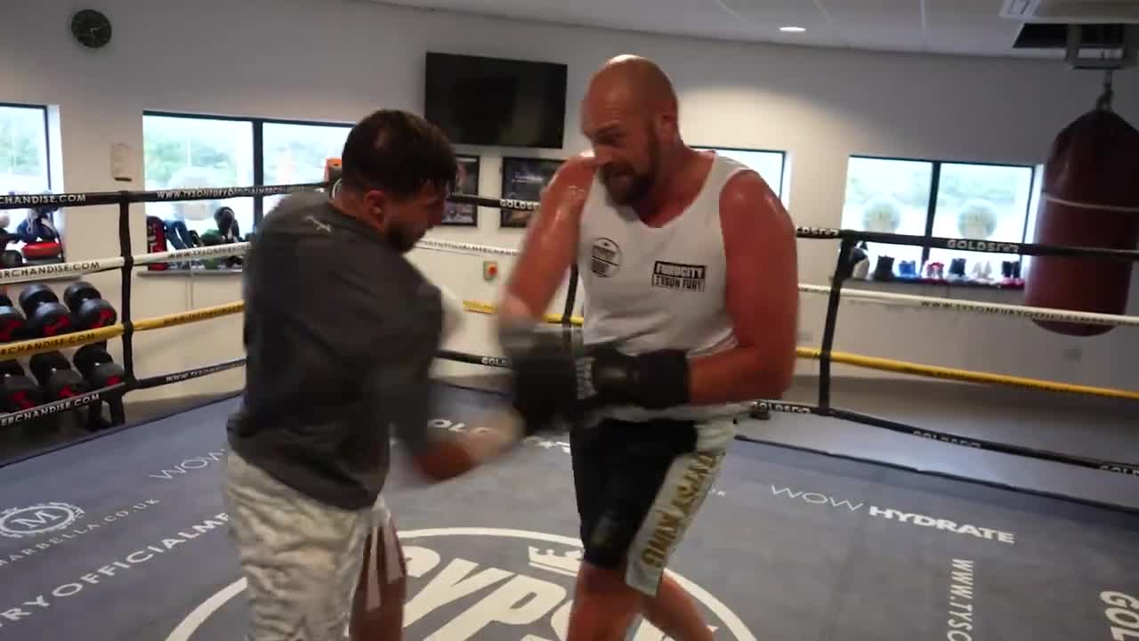 Tommy and Tyson Fury sparring/messing about. : r/Boxing