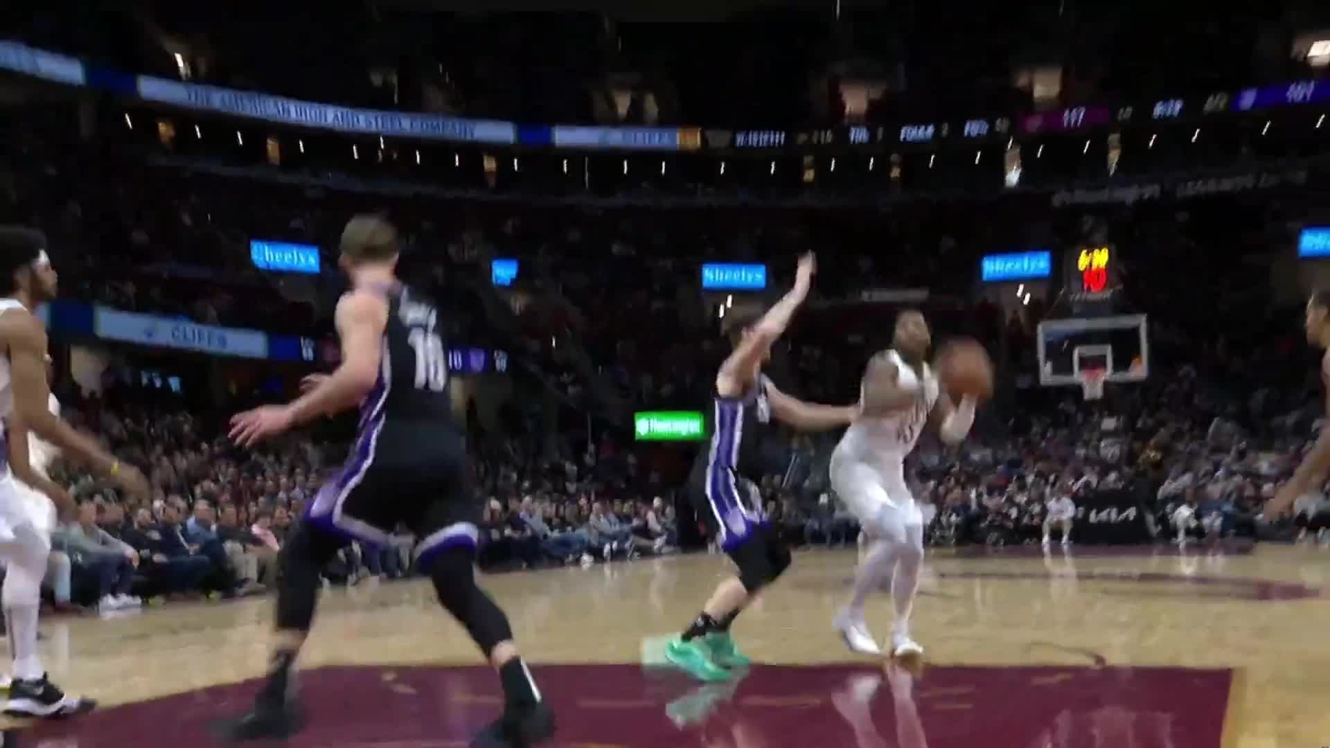 Watch Donovan Mitchell is seemingly trapped, but spins around throws off the backboard and slams