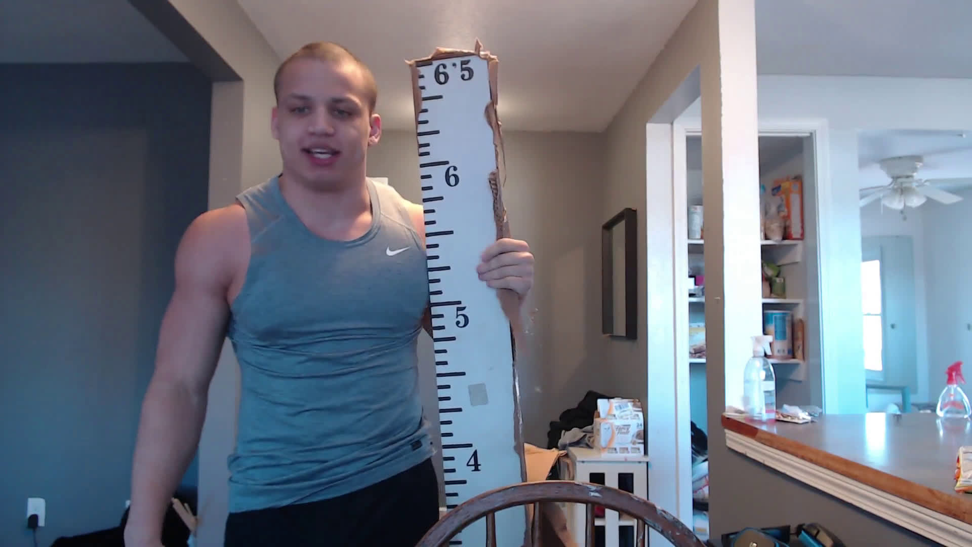 tyler1 proves his height to twitch chat - Embed.