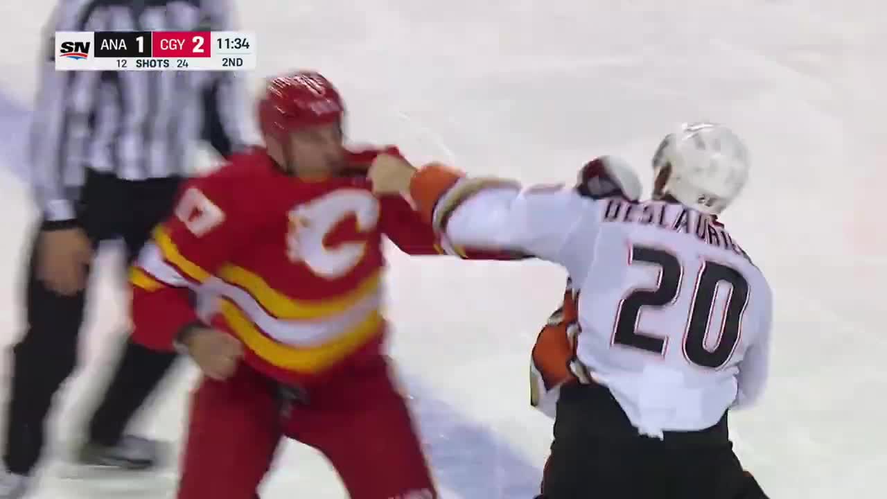 Milan Lucic accidentally punches linesman in the face during fight